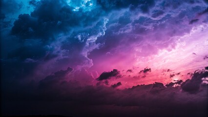 Poster - The sky is filled with clouds of different colors, including blue, purple