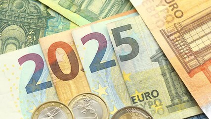 Wall Mural - 2025 in the Eurozone. Euro banknotes arranged in the symbol of 2025, Financial business concept. Economic analysis. European Union market. close-up, Business background