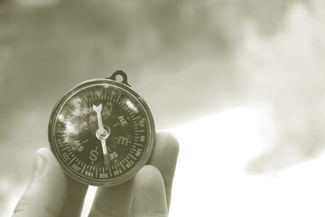 Wall Mural - classic navigation compass on natural background