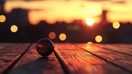 Poster - Glass sphere on wooden surface at sunset, city bokeh background. (1)