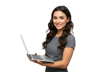 a confident woman with wavy dark brown hair, wearing a gray dress, holding a laptop and smiling warm