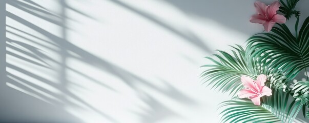 Wall Mural - Tropical palm leaves and pink flowers casting shadows