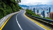 An asphalt road winding through mountains with a city skyline in the distance