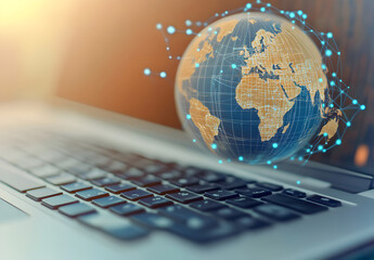 Wall Mural - A globe with global network connections floating above the keyboard, symbolizing online connectivity and worldwide internet connection technology 