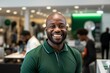 © larisikstefania - Portrait positive smiling African American man, in green work polo shirt, on blurred background