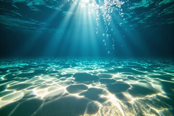 Poster - Sunlight streaming through the underwater ocean surface, illuminating the sea floor with rippling patterns.
