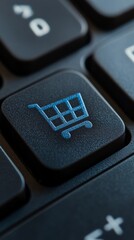 Poster - Close up photograph of a modern, black keyboard features a prominent, blue shopping cart icon on a key, representing the ease and convenience of online shopping and e commerce