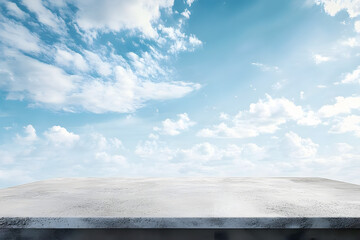 Poster - Wide empty grunge cement counter table top on blue sky clouds white light background for business product windy scene, blue sky empty land back a concrete road way