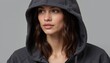 © yuntunen - Close-up of model wearing hoodie with hood up, highlighting fabric texture and details, set against neutral backdrop