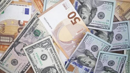 Poster - Table cluttered with euro and dollar notes captures essence of forex trading with investors speculate on currency values to profit from fluctuations between currencies
