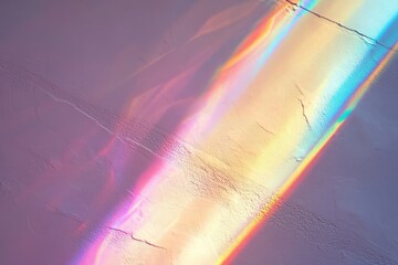 Crystal prism rainbow light refraction against a white wall, suitable for natural light overlay effects or artistic textures