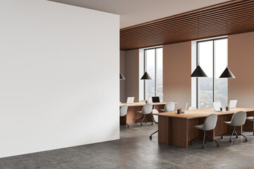 Poster - empty white wall mockup inside a modern office space with natural light and wooden furniture. 3d ren