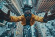 © Yuliya - Urban Freefall: A young man in a mustard yellow jacket embraces the thrill of a simulated freefall amidst the towering skyscrapers of a modern city.  His arms outstretched.