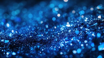 Poster - A mesmerizing blur of shimmering blue glitter sparkles in soft focus, creating a magical atmosphere.