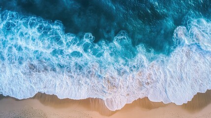 Leinwandbilder - Aerial view of ocean waves crashing on sandy beach with empty space for text or design elements