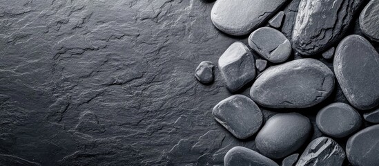 Poster - Abstract dark gray pebble texture background suitable for text overlay minimalist design elements copy space concept