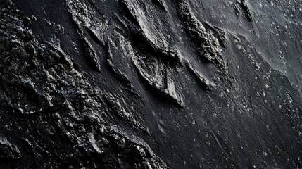 Leinwandbilder - Aerial view of textured volcanic ash foam on a dark background ideal for creative projects and design elements with empty space for text