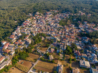 Aerial drone  Cityscape  view of traditional mountain village Liapades at Corfu Island (Greece). 