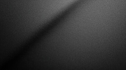 Poster - A close-up view of a textured black surface, showcasing subtle details and a smooth gradient effect.