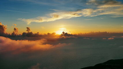 Wall Mural - aerial view of bright sunset clouds