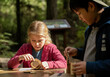 © Rizka - Children Crafting with Wood in Forest