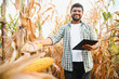 © Serhii - South asian agronomist farmer inspecting corn field farm. Agriculture production concept