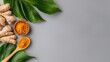 © Olga - Golden Goodness: Turmeric Root and Powder with Fresh Leaves for a Healthy Lifestyle.