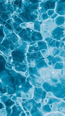 Poster - Crystal clear blue water surface gently ripples and reflects light, creating a mesmerizing abstract pattern, ideal as a background or texture for various design projects