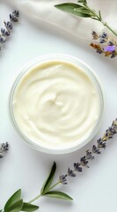 Poster - Glass jar with moisturizing cream is surrounded by lavender flowers and green leaves on a white background with soft beige cloth, creating a serene and natural spa like setting