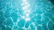 © Alfath - Sparkling sunlight reflecting on turquoise swimming pool water.