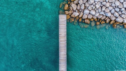 Canvas Print - Peaceful Wooden Jetty Overlooking a Serene Turquoise Lake With Tranquil Reflection