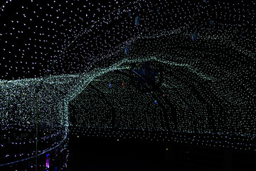 multidimensional light tunnel, dark background, no one