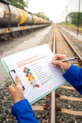 Wall Mural - checking on chemical hazard material checklist, for the crude oil transportation by railway logistic
