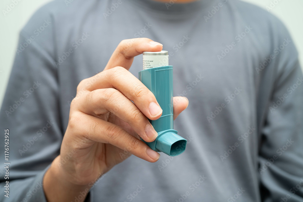 Asthma and chronic obstructive pulmonary disease COPD, Asian young man ...