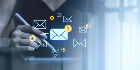 Poster - Digital communication concept featuring email icons and notifications floating over a person using a stylus on a tablet screen.