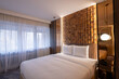 © rilueda - interior of a modern hotel bedroom in the morning