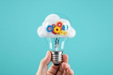 Poster - Light bulb with cloud and colorful gears inside on blue background, symbolizing innovation, creativity, and brainstorming concept.