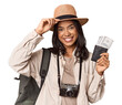 © Asier - Young filipino woman with tickets and camera ready to travel
