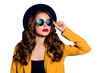 © deagreez - Closeup photo of amazing fashionable lady wear stylish hat yellow costume isolated purple background