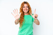 © luismolinero - Young caucasian woman isolated on white background counting seven with fingers