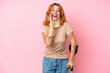© luismolinero - Young caucasian woman wearing neck brace isolated on pink background shouting with mouth wide open