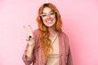 © luismolinero - Young caucasian woman isolated on pink background With glasses and doing OK sign