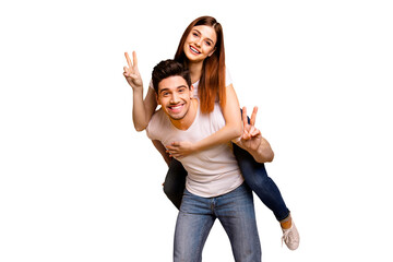 Portrait of his he her she two nice attractive cheerful cheery optimistic people having fun vacation holiday showing v-sign isolated over vivid shine bright yellow background