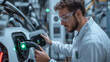 © Nati - A clean-cut engineer charges an electric prototype vehicle in a laboratory setting. The close-up focuses on his precise grip on the cable, the glowing green indicator light, and hi