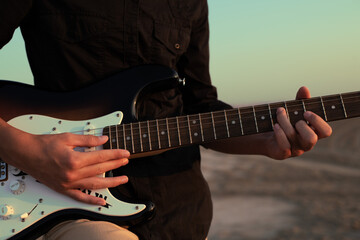 man playing guitar