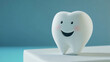 © InspirationDesign - Friendly tooth character on teal background, dental care concept