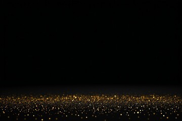 Wall Mural - a close up of a black background with a gold glitter dust