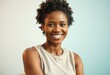 © iushakovsky - A portrait of an afro-american woman with a warm and friendly smile
