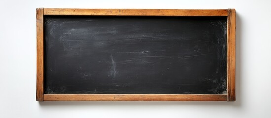 Poster - Classic Black Chalkboard Framed in Wood Against White Background Featuring Ample Copyspace for Text or Creative Messaging