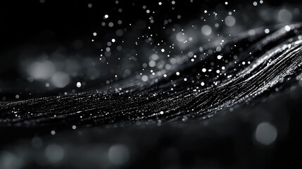 Poster - Bokeh light shimmering effects on a black background ideal for artistic illustrations and graphic design projects